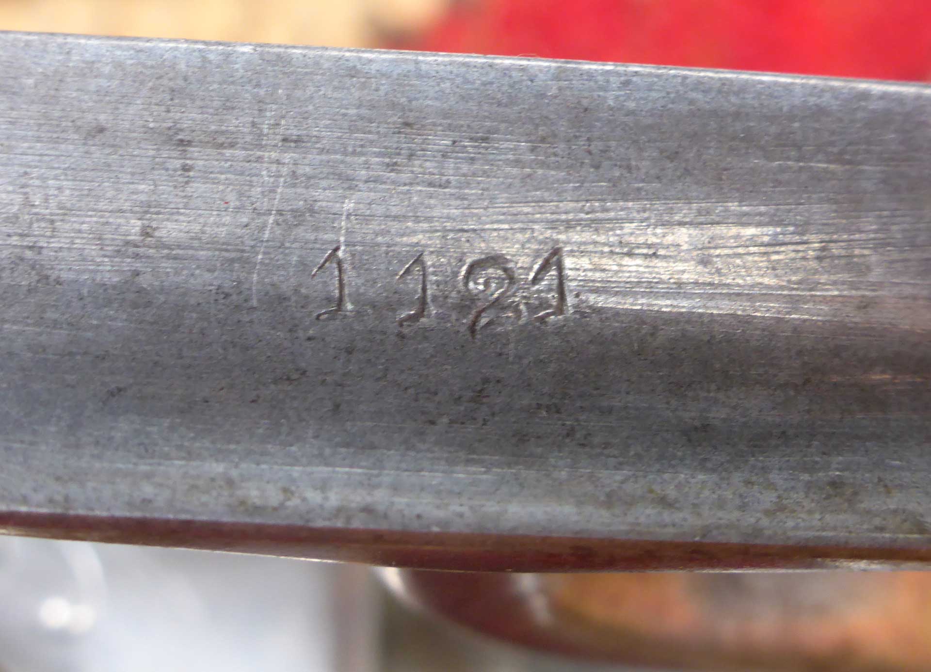 Die Nr. 1121 hat dann schon den gerägten Schriftzug "Triplex A" und den hellen Holzknauf.